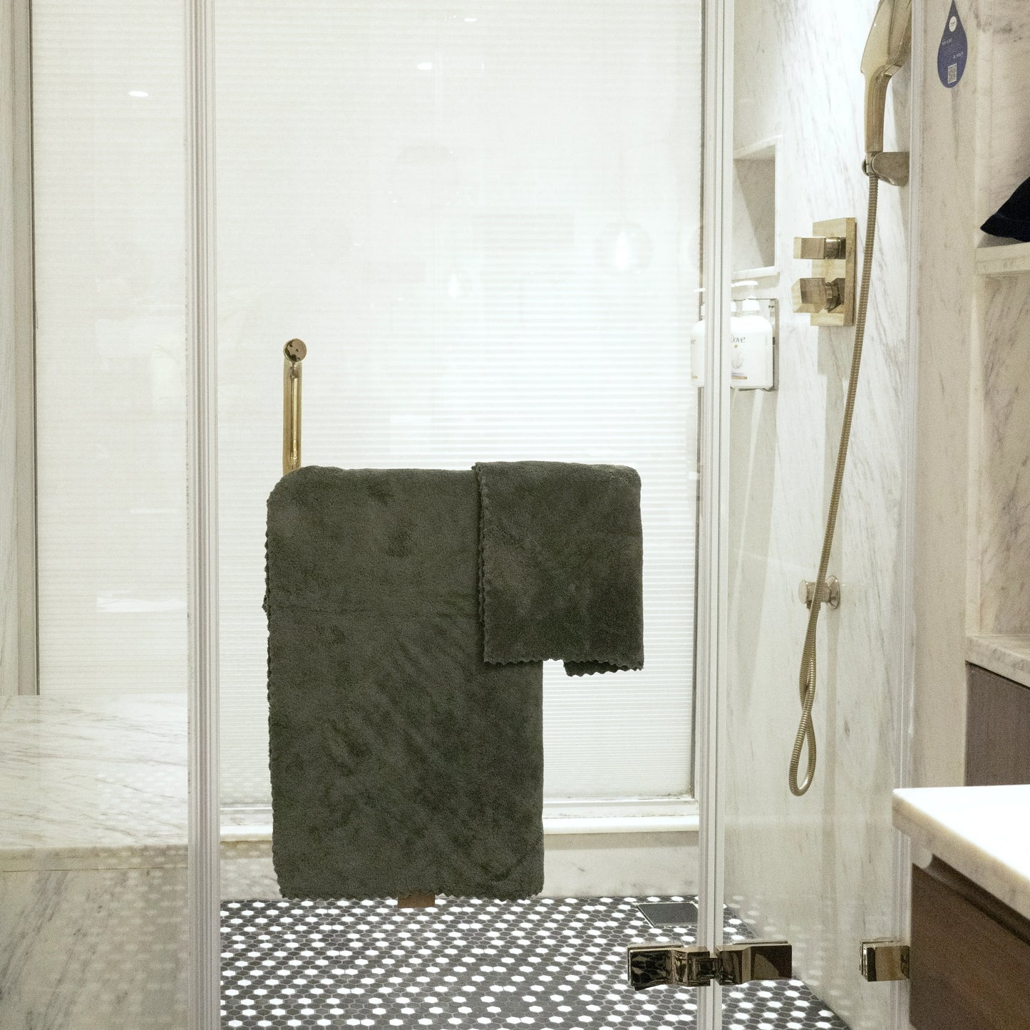 Textured detail of olive green towels from the Soft Craze 4-piece combo
