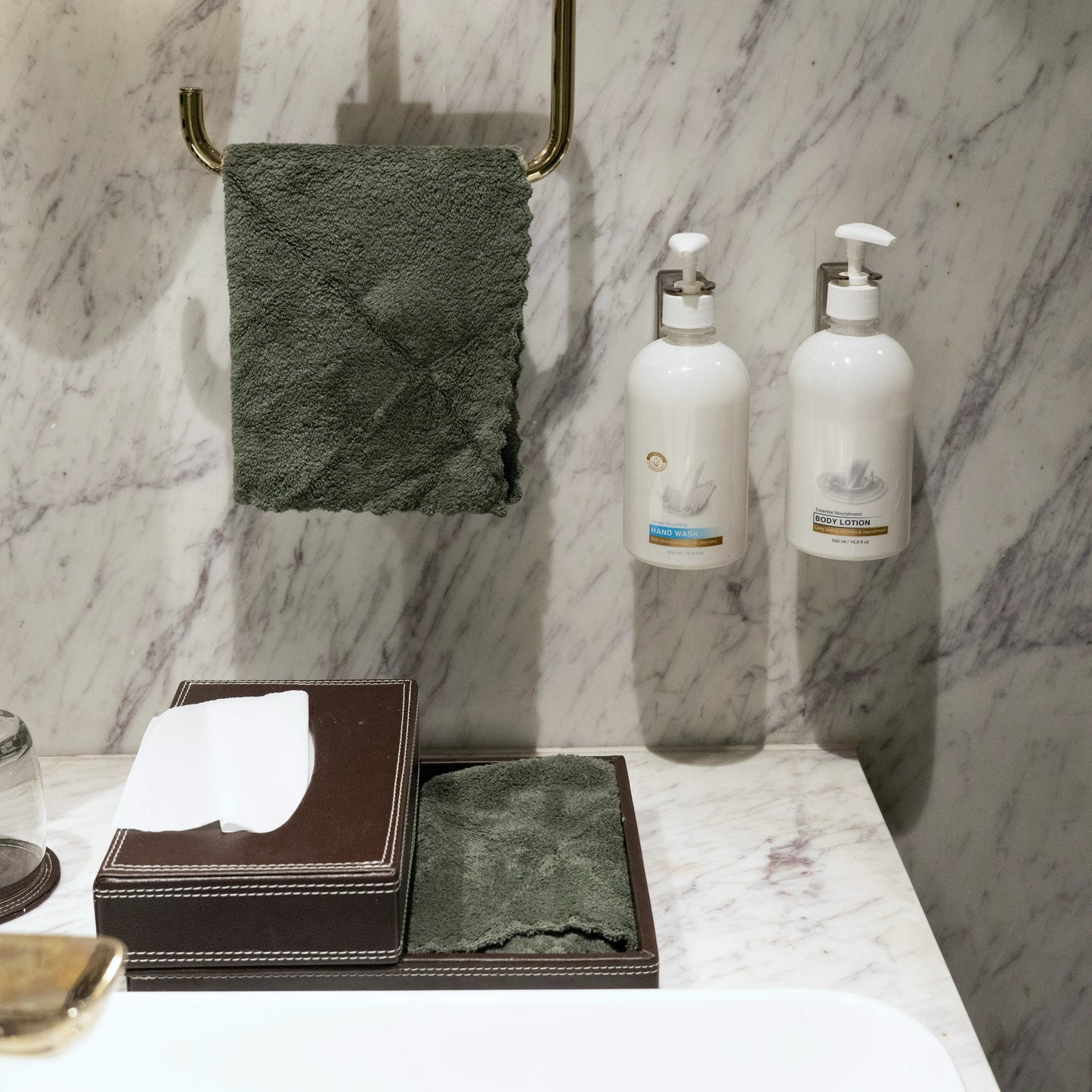Olive green Soft Craze towel set styled in a spa-like environment