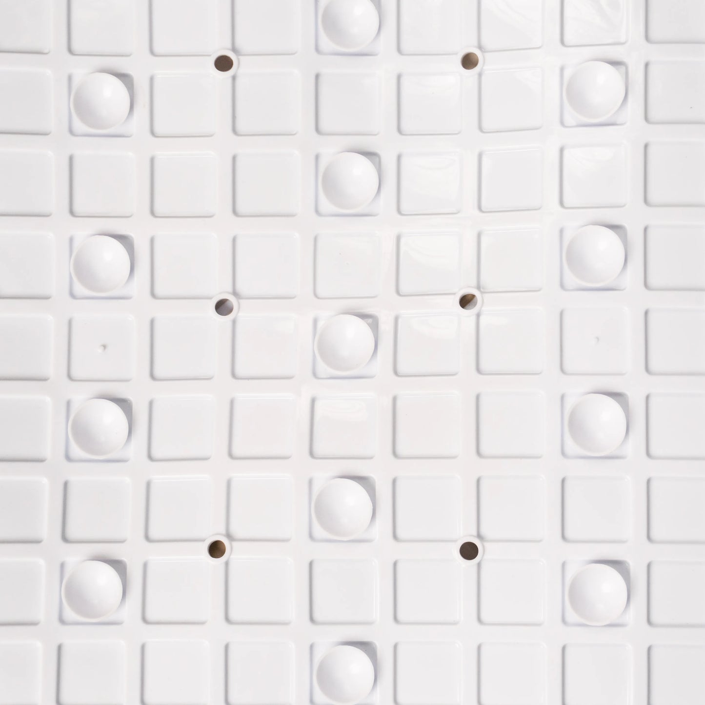 Close-up view of bathroom mat backside texture.