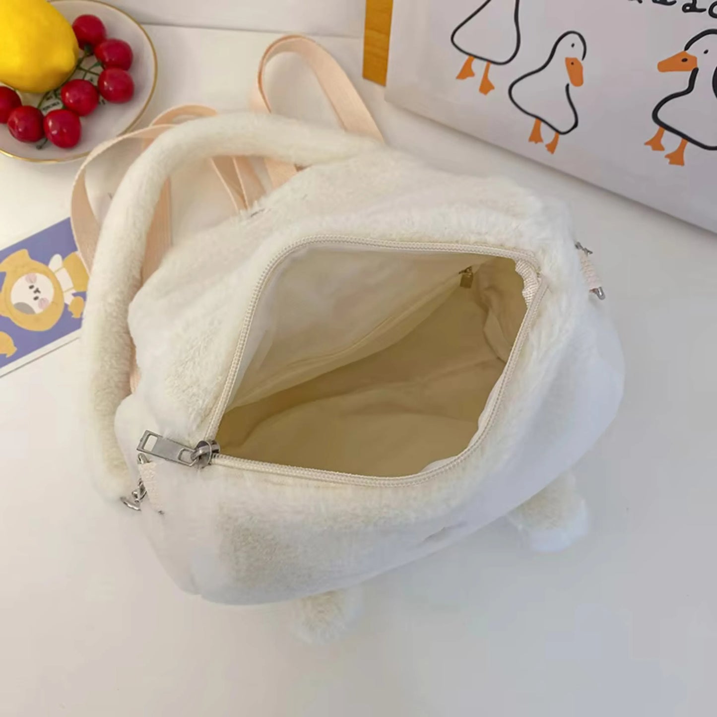 Fluffy white convertible backpack open
