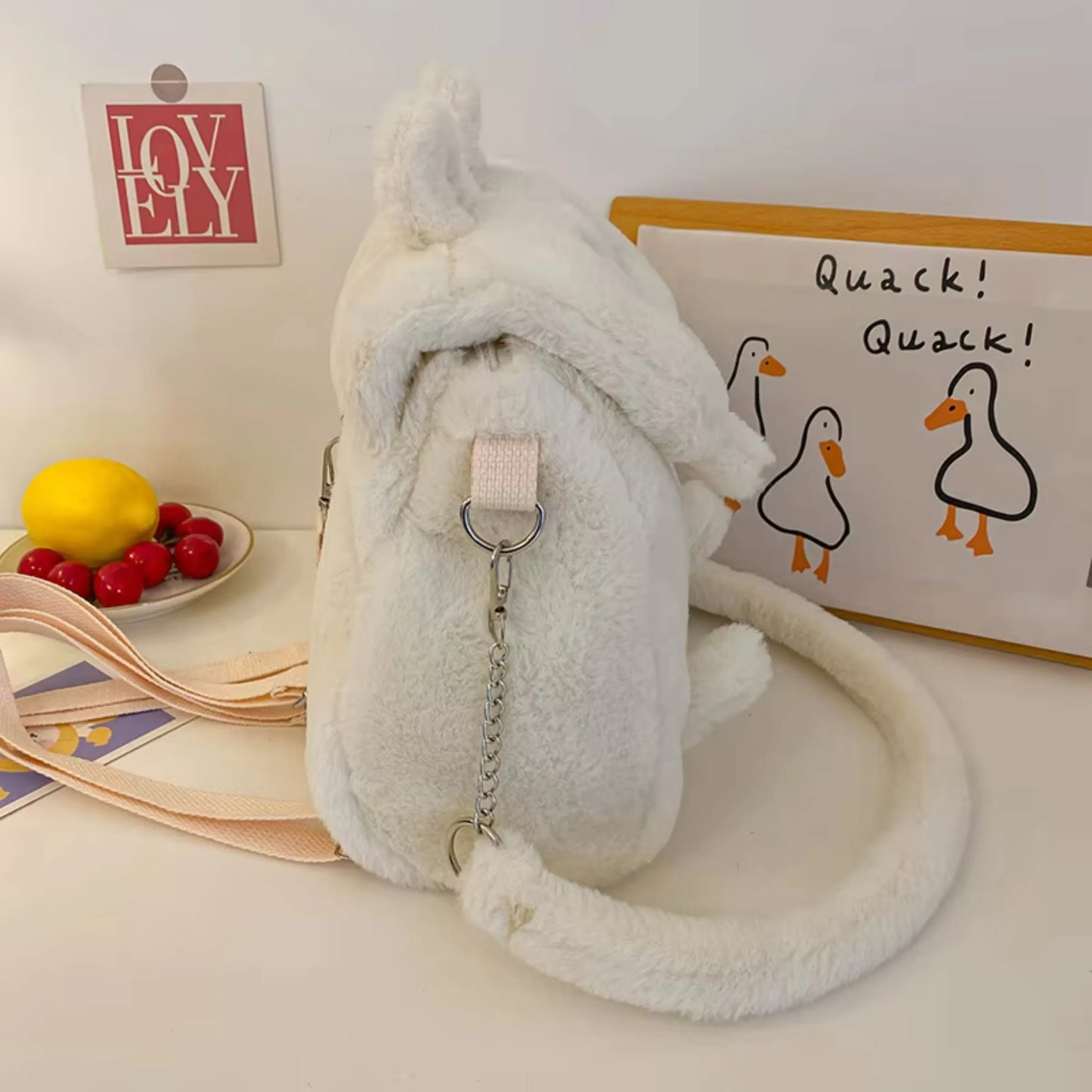 Side view of Fluffy white convertible backpack for women