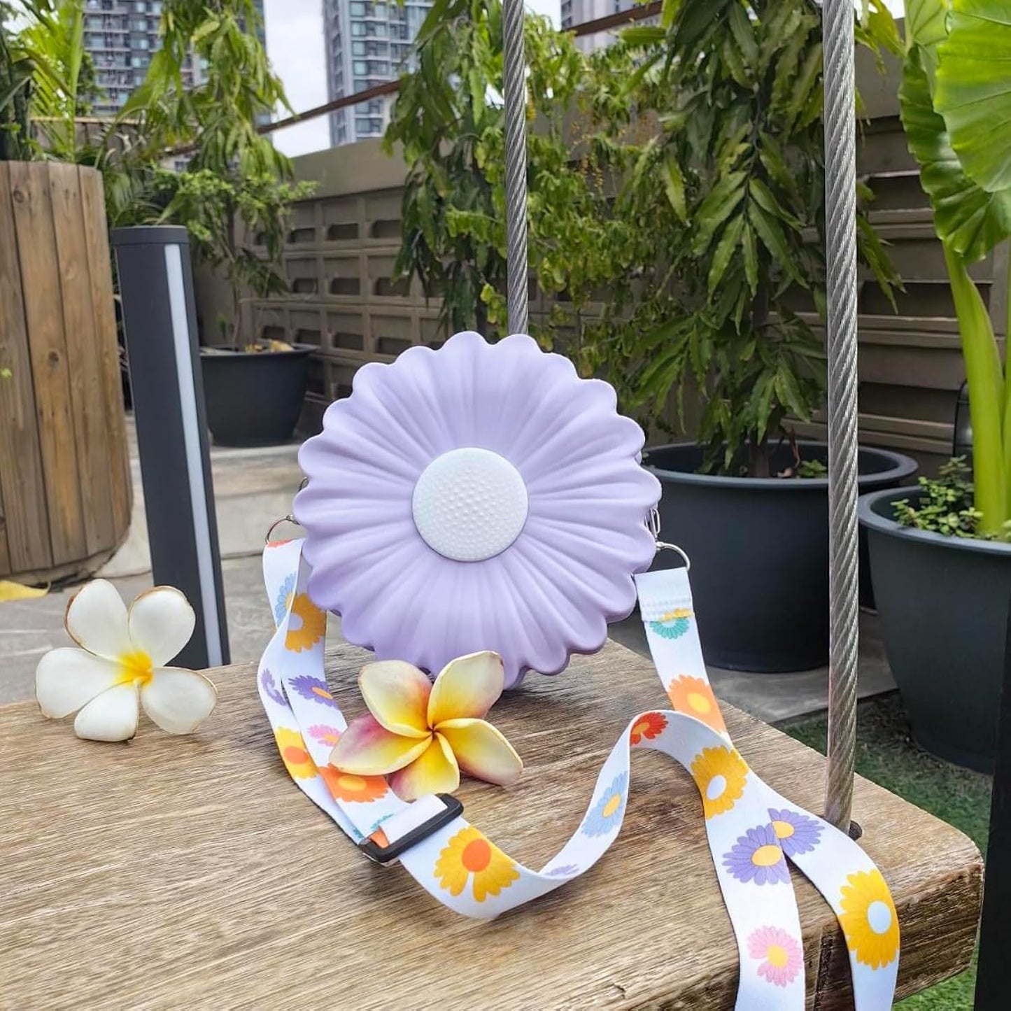 Purple Daisy Delight Mini Crossbody Bag in lavender with daisy print strap