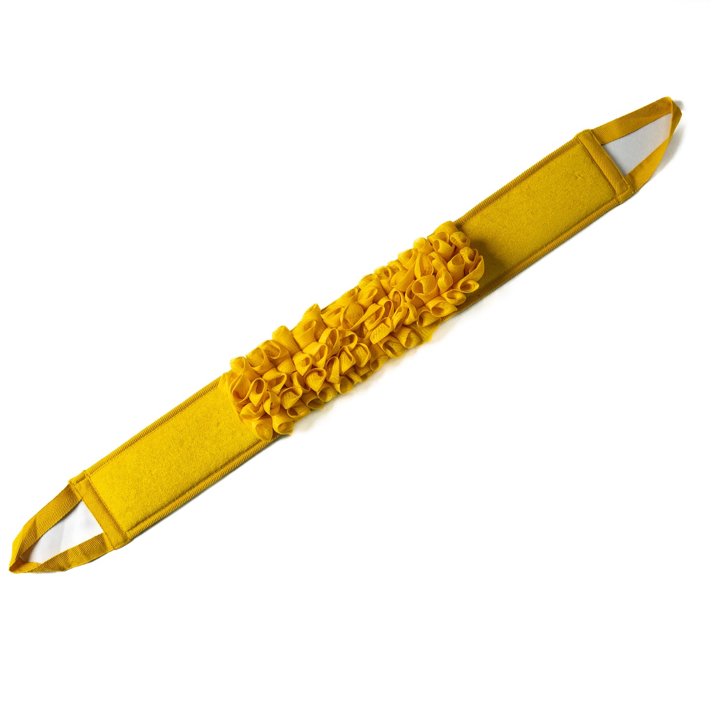 Yellow glow loop fully spread out on a flat surface.