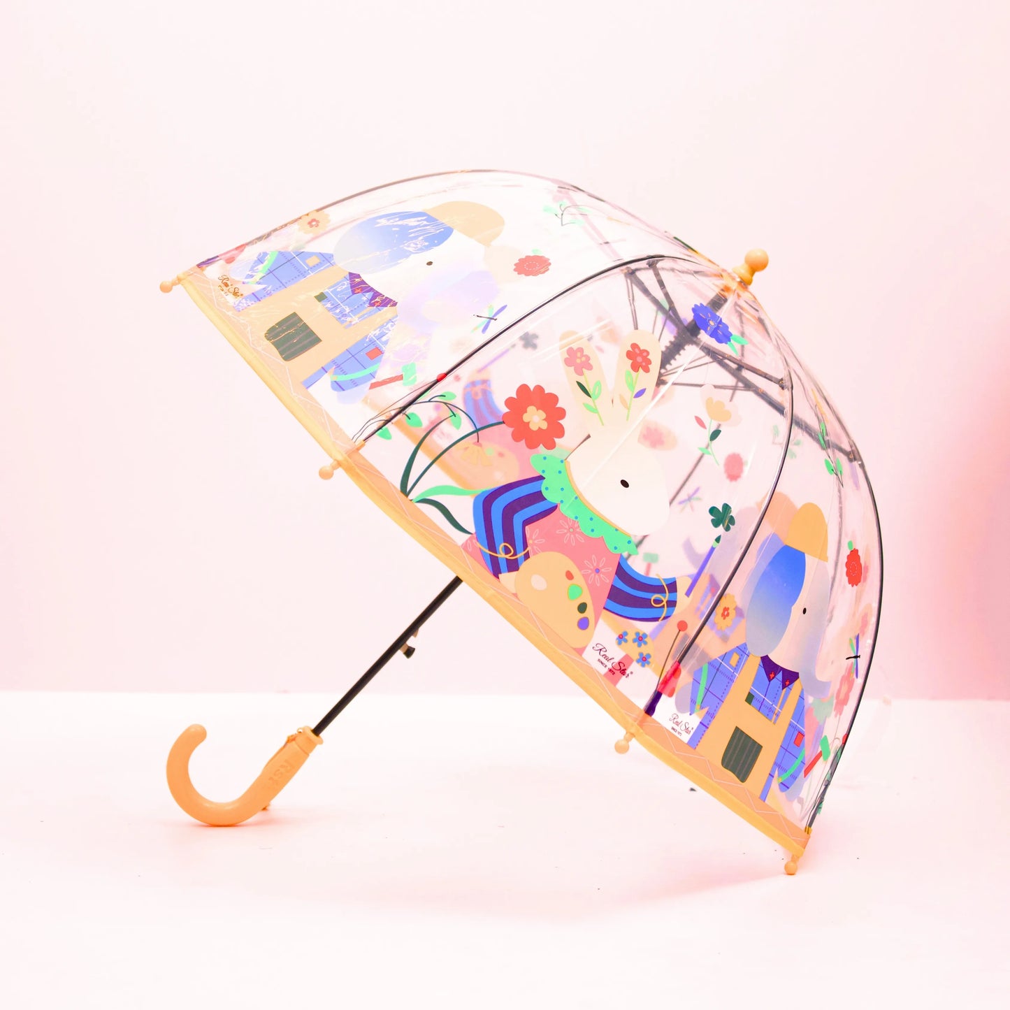 Close-up of yellow umbrella handle and design
