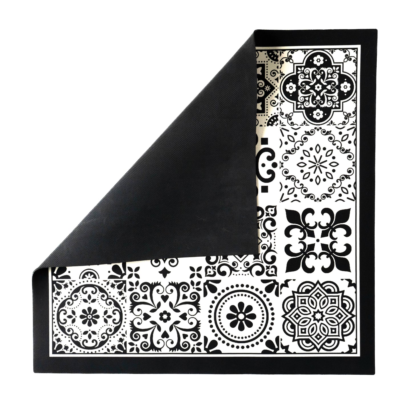 Black mat folded slightly showing backside.