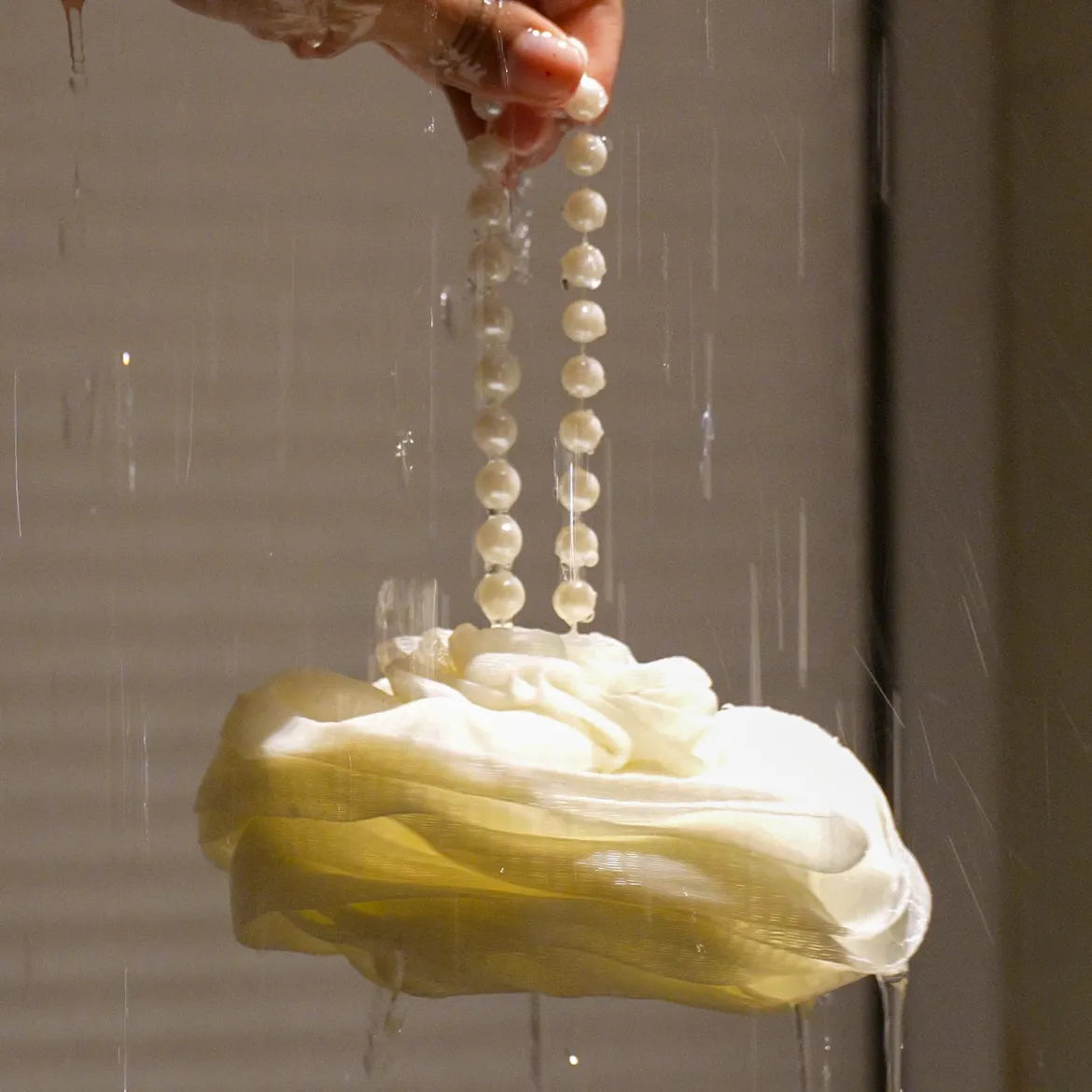 Foam Ease Plush Loofah Body Cleaner with soft textured surface for gentle exfoliation