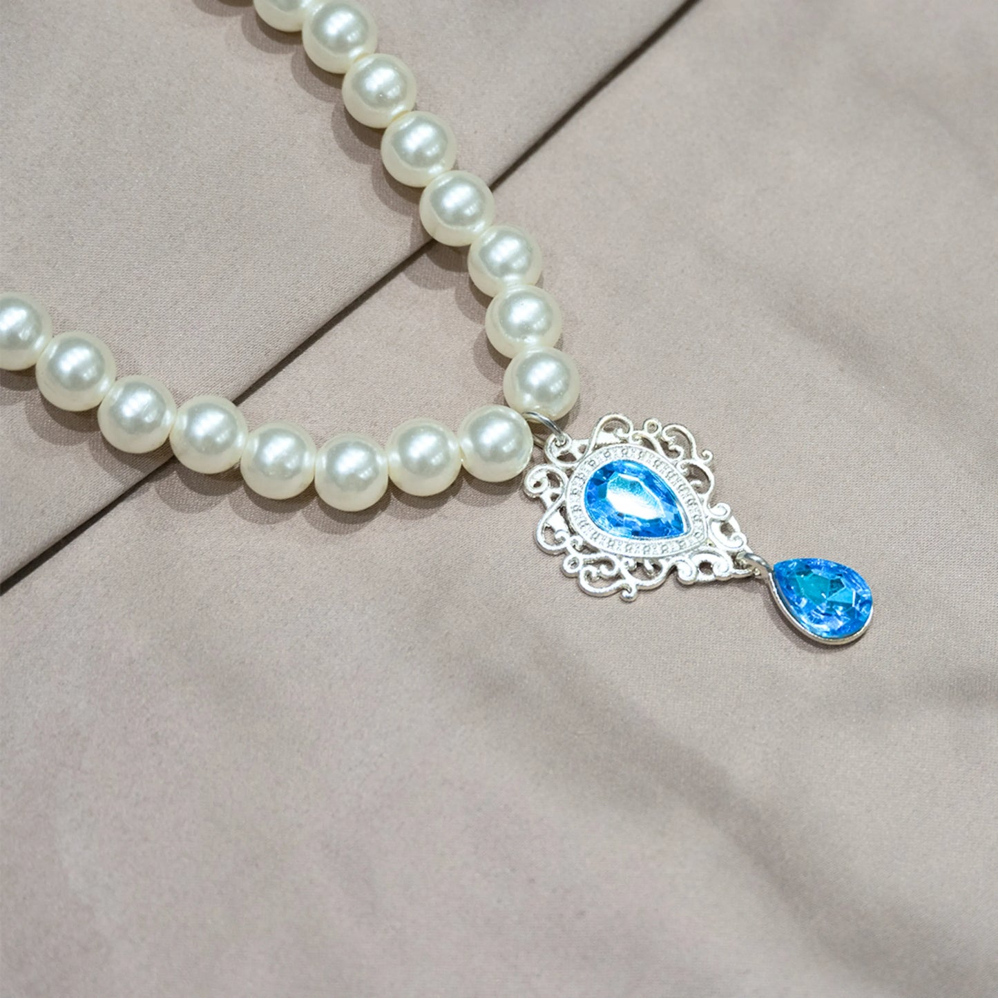 Pet pearl necklace with sky blue semi-precious gemstone pendant