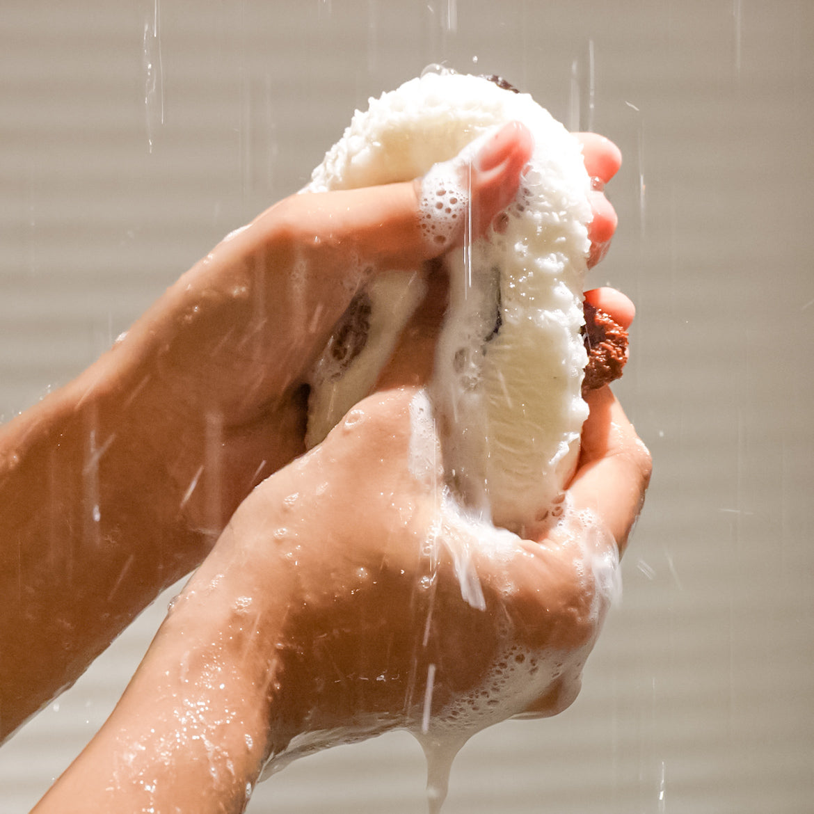 Loofah body cleaner from Foam Ease styled with minimal spa accessories