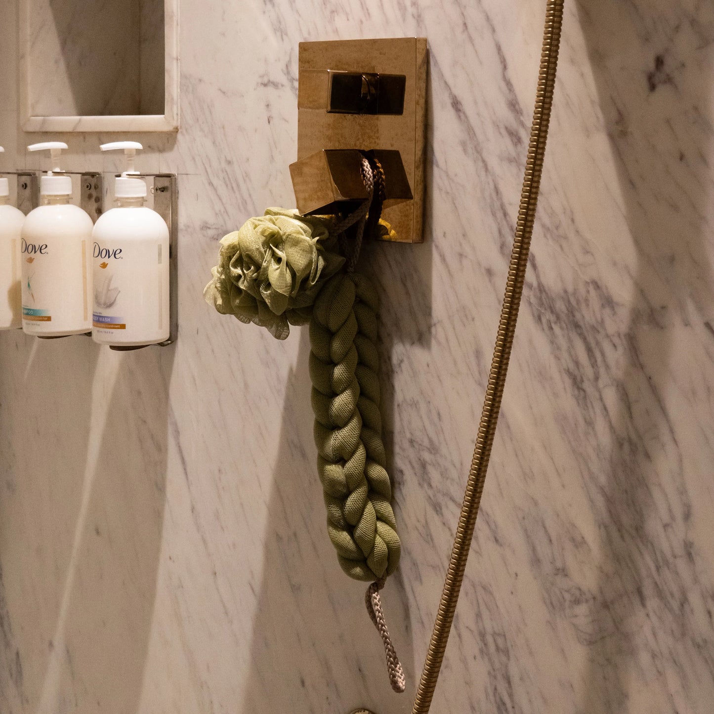 Green variant of Soothe Luxe ribbon bow bath combo displayed on natural background