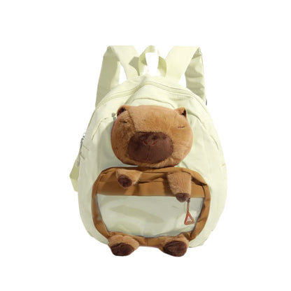 Front view showing accessories inside of white Cuddly Buddy Backpack