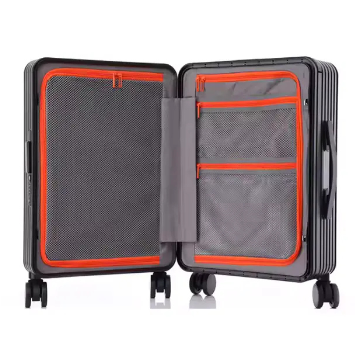 Suitcase opened, showing interior compartments.
