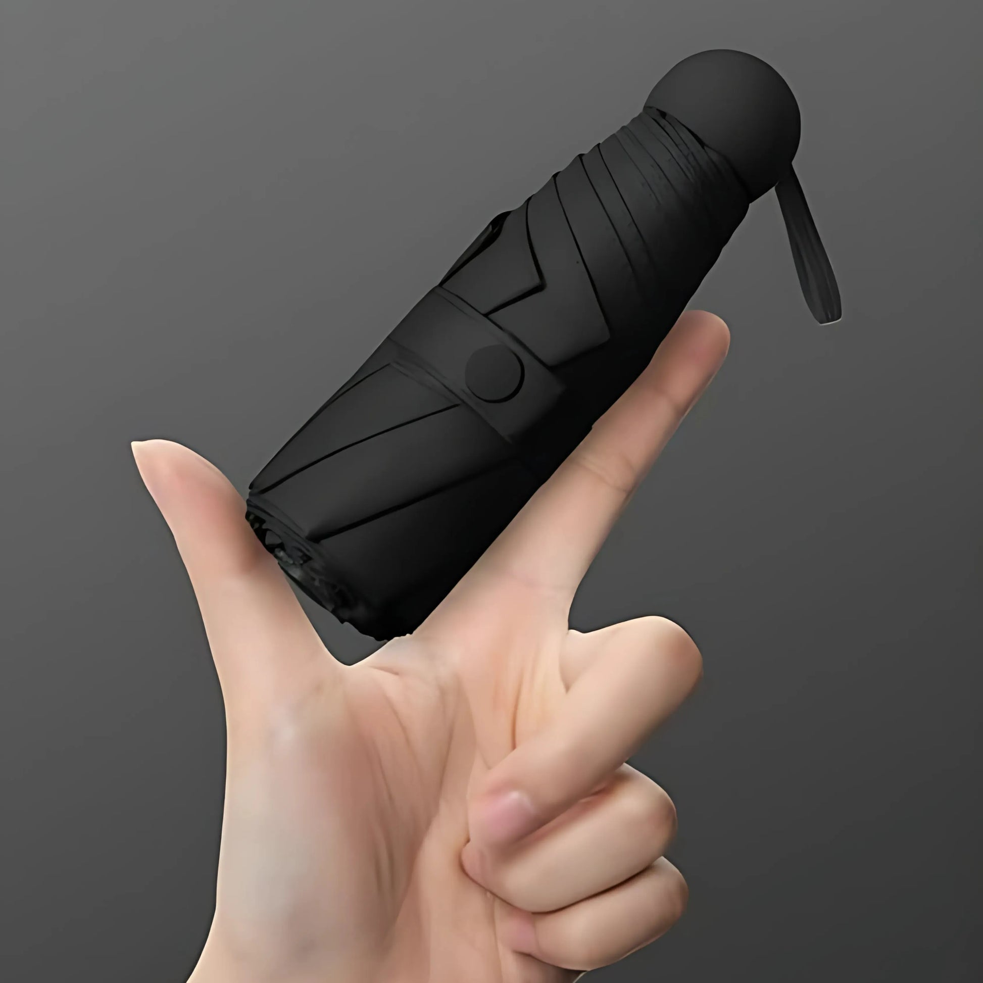 Pocket-sized umbrella opened in the rain