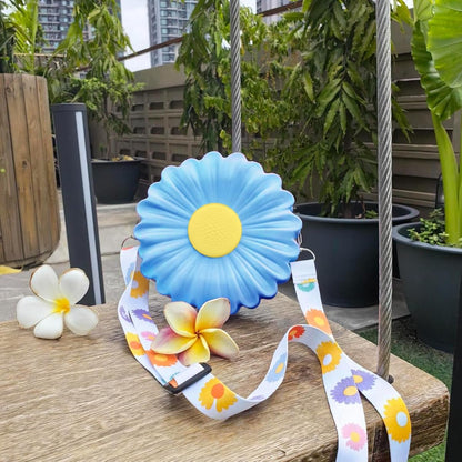 Blue Daisy Delight Mini Crossbody Bag in lavender with daisy print strap
