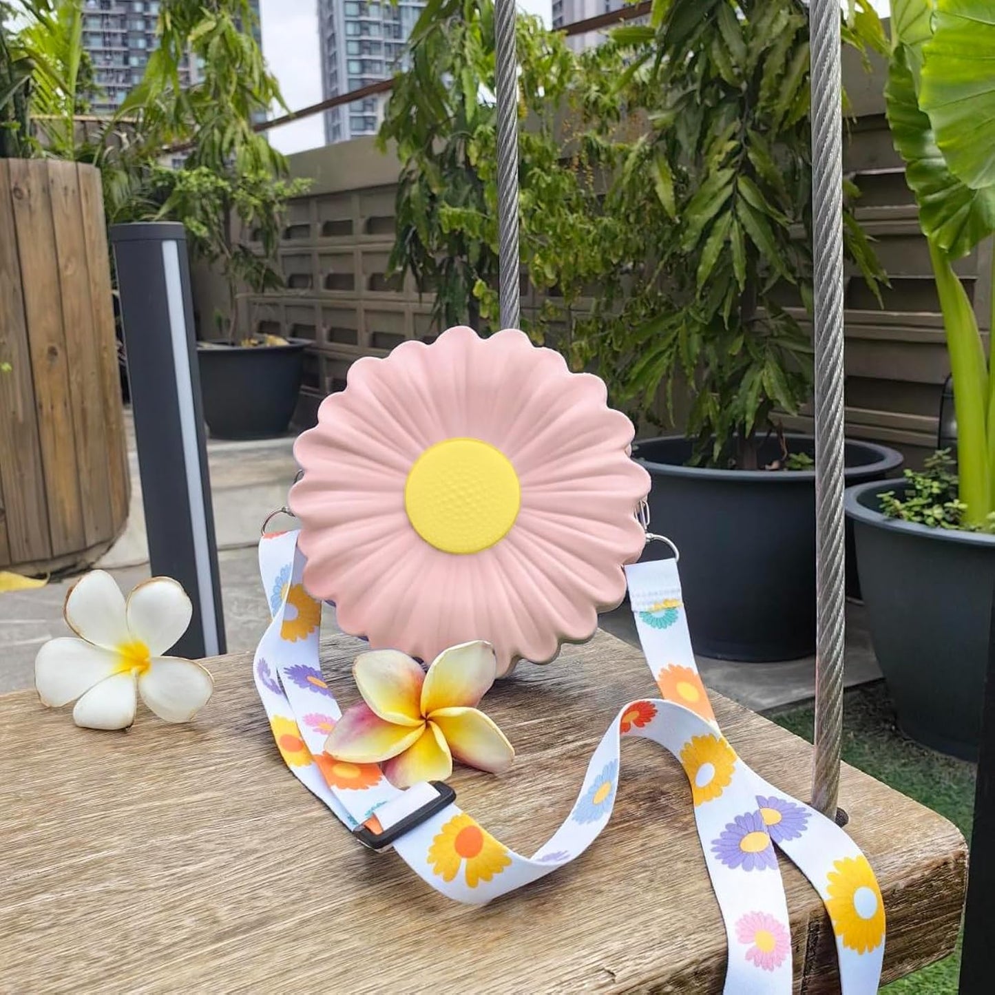 Pink Daisy Delight Mini Crossbody Bag in lavender with daisy print strap
