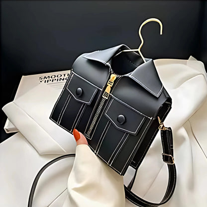 Tilted view of black Luxury Jacket Style Handbag with tailored pocket details