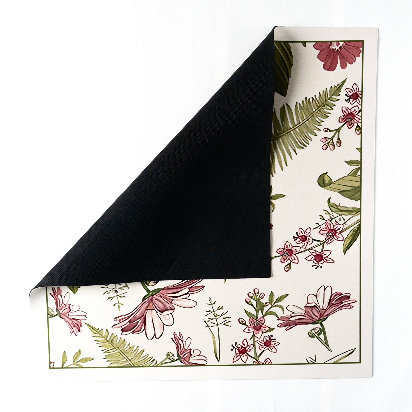 Pink mat folded slightly showing backside.