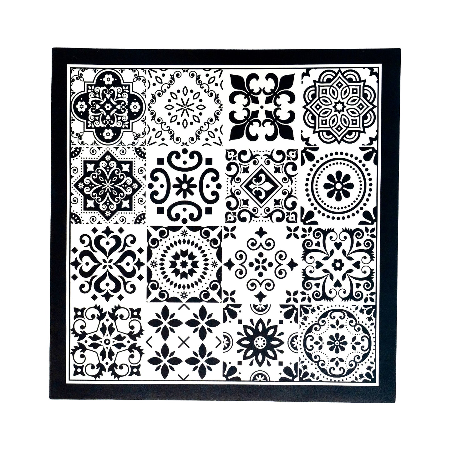 Black multifunctional mat placed on flat surface.