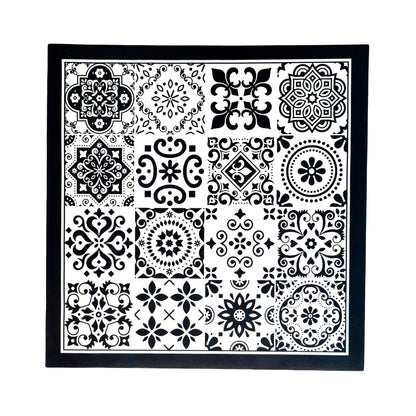 Black multifunctional mat placed on flat surface.