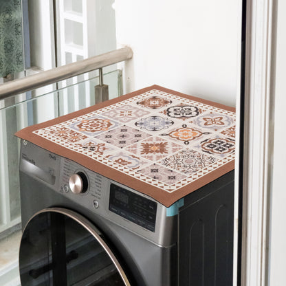 Beige mat placed on top of washing machine.