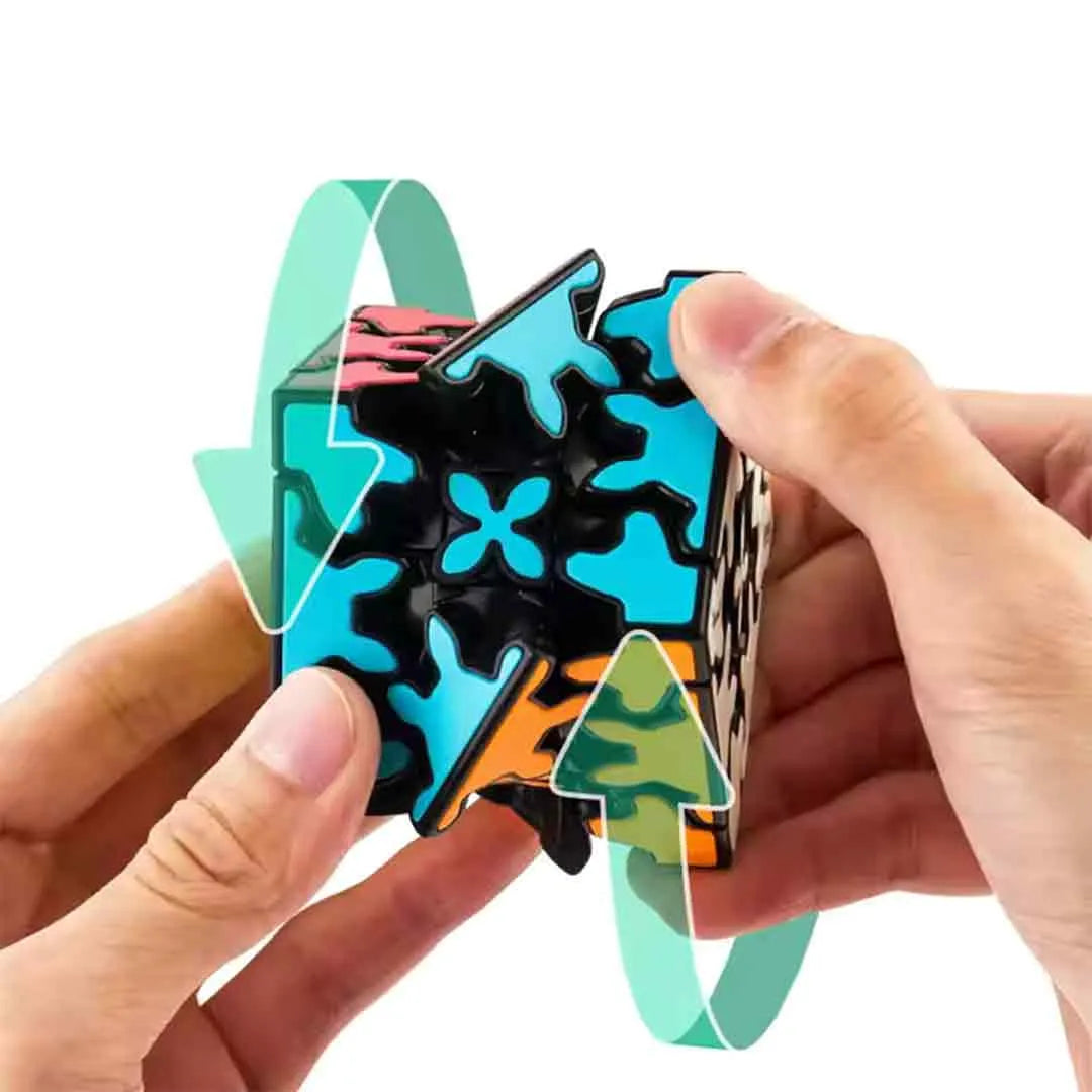 Hand twisting the gears of the Neon Gear Cube Keychain