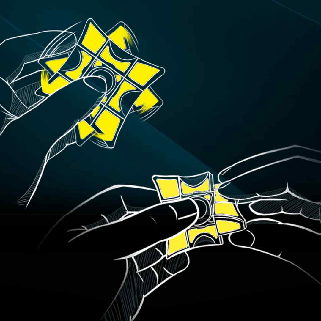 Side view of fidget spinner showing textured grip and puzzle cuts