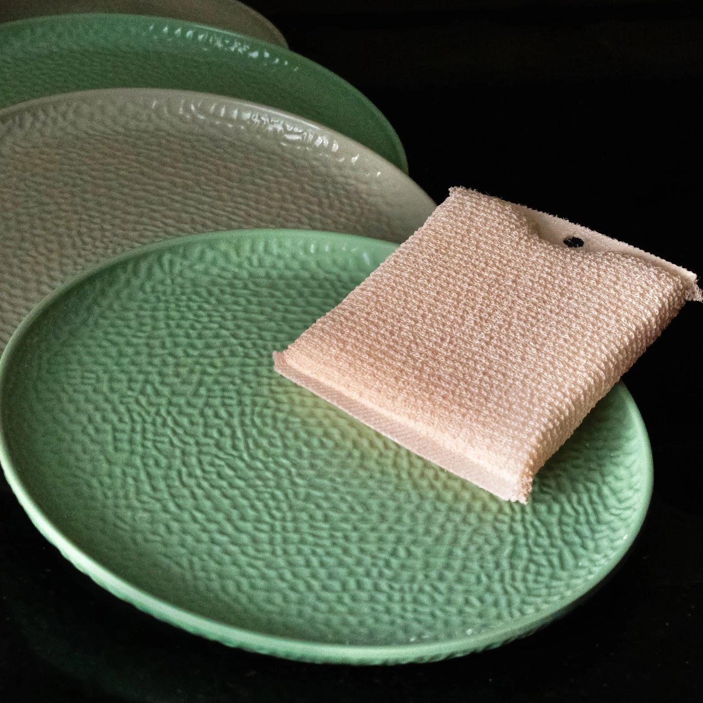 vibrant orange oil wipe placed near the plate