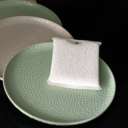 sleek white oil wipe placed on the plate