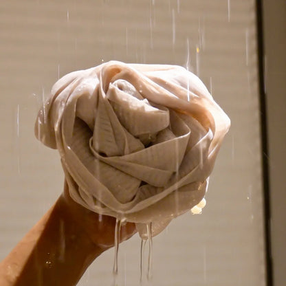 Close-up of Foam Ease Plush Loofah showing dense mesh and comfortable grip
