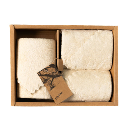 Light cream Loom Touch towels displayed 