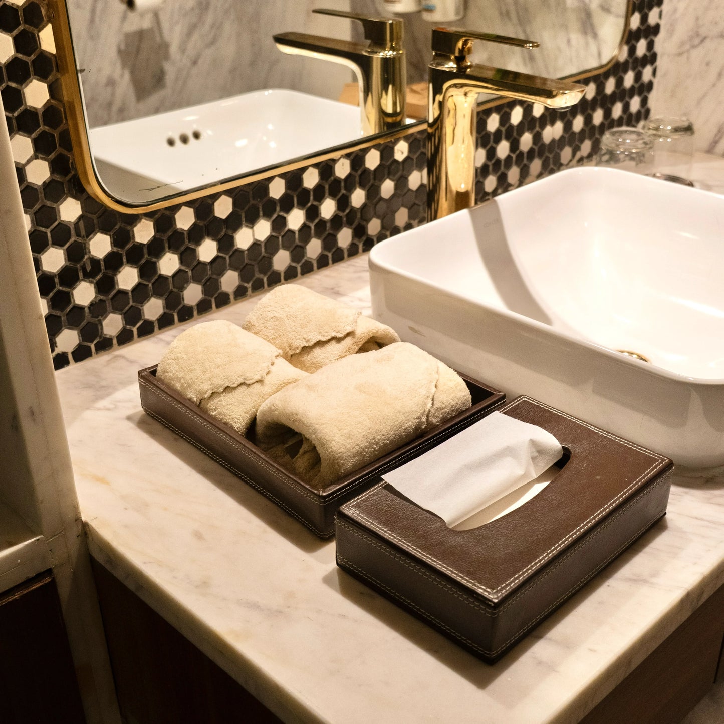 Close-up of plush light cream towels from the Loom Touch trio collection