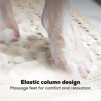 Foot pressing into soft elastic massage columns on a shower mat.