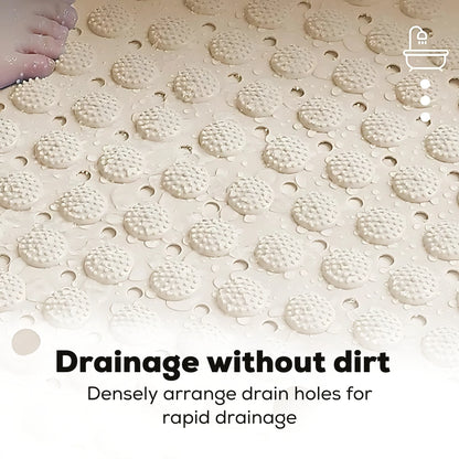 Close-up of large round suction cups on the back of a bath mat for strong grip.