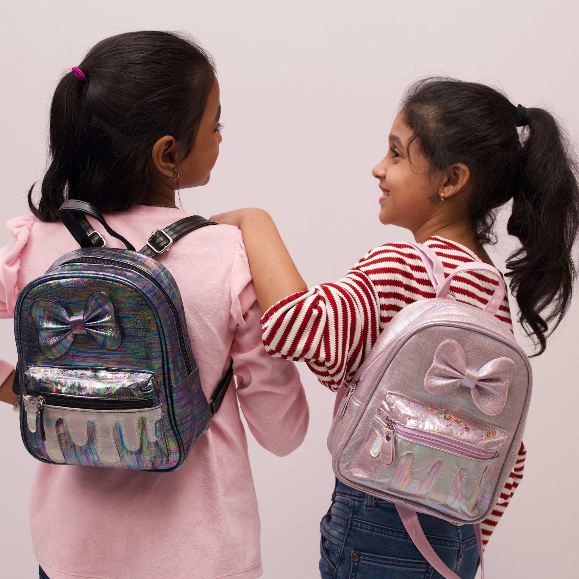 Fancy glitter displayed pink and white colour bag for kids