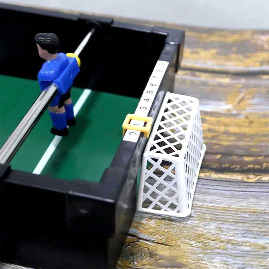 Zoomed-in view of a goal scored during the foosball match
