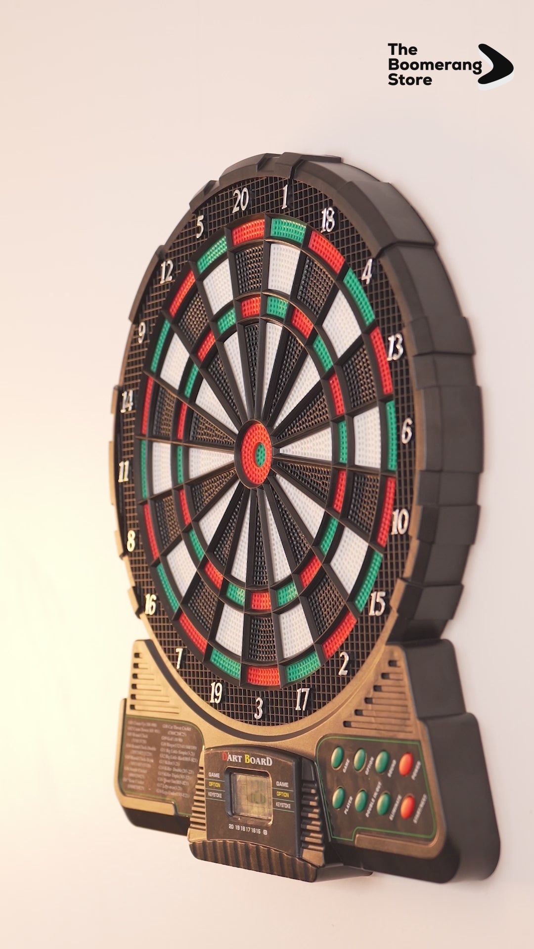Electronic dartboard with digital display and six red darts.