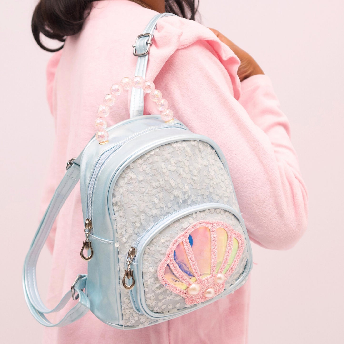 Cute mini backpack for girls with glitter and seashell design